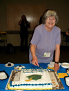 Donna cutting cake